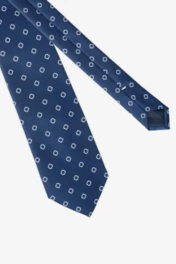 Cravatta disegno geometrico blu