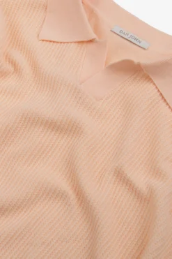 Polo in maglia collo aperto armaturata pesca