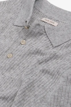 Polo in maglia costa piatta melange grigia