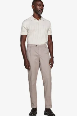 Polo in maglia costa piatta sabbia
