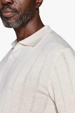 Polo in maglia costa piatta sabbia