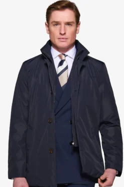 Trench con pettorina navy